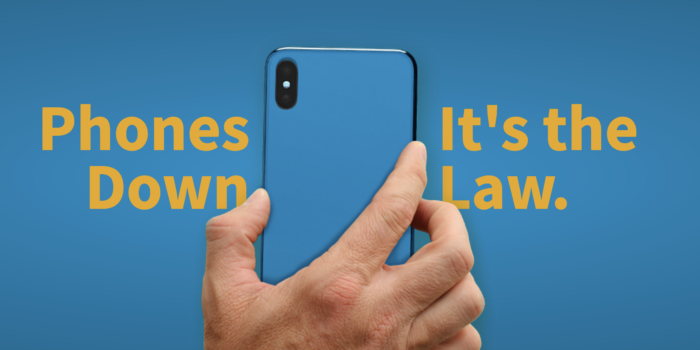 photos of cell phone with Phones Down It's The Law